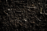 Fototapeta Abstrakcje - Screws background. Background of many screws
