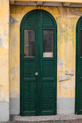 Wall Mural - View of old building with green door