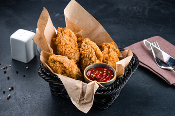 Wall Mural - Fried chicken nuggets with ketchup.