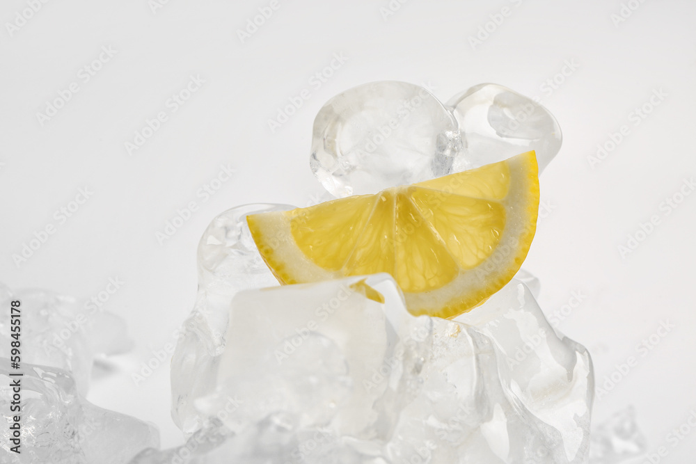 Sliced fresh lemon and ice isolated on white background