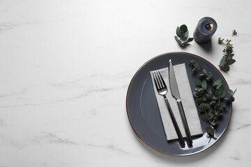 Sticker - Stylish setting with cutlery and eucalyptus leaves on white marble table, flat lay. Space for text