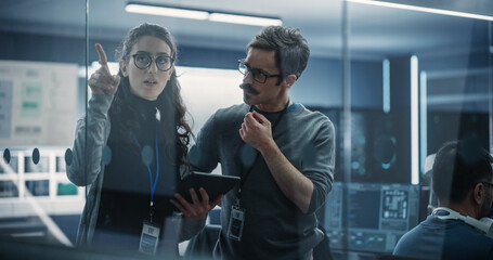 Aufkleber - Multicultural Chief Technology Officer Talking to Software Developer, Discussing Neural Network Updates in High Tech Research and Development Facility. Professional Computer Specialists at Work