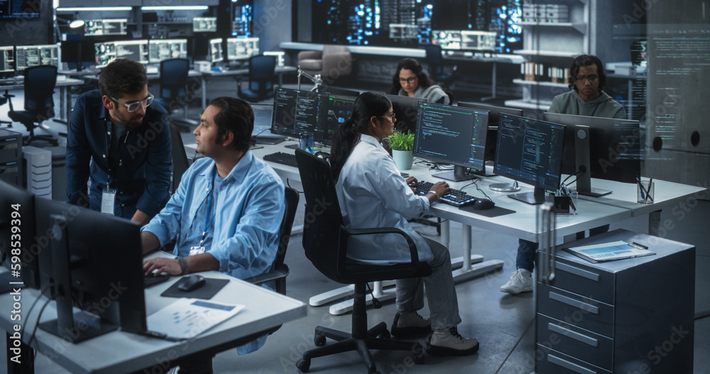 Young Team of South Asian Specialists Working on Computers and Having a ...