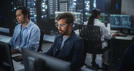 Aufkleber - Portrait of a Handsome Indian Engineer Working on Desktop Computer in a Technological Office Environment. Research and Development Department Writing Software Code for an Innovative Internet Project