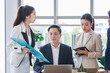 © Bangkok Click Studio - Group of Asian stressed depressed worried tired professional successful female businesswomen and male businessmen employees in formal business suit arguing disagreement about strategy in meeting room