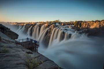 wide angle view of the augrabies falls in full flood on the orangeriver in the northern cape of sout
