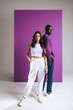© Jacob Lund - Confident young people showing confidence in their style as they stand in a studio wearing casual clothing