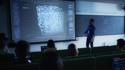 Fototapete - Young University Professor Explaining the Importance of Artificial Intelligence to a Group of Diverse Multiethnic Students in a Dark Auditorium. Teacher Showing Neural Network on Two Big Screens