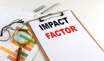 Poster - IMPACT FACTOR text on clipboard with chart on white background, business concept