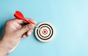 Aufkleber - Business hands holding arrow focus to target icon. dartboard and arrow for creative and set up business objective target goal, marketing solution, target for business investment.