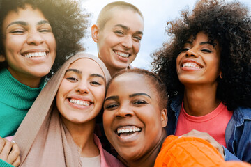 Wall Mural - Group of women friends smiling for selfie picture at camera - Happy people having fun together celebrating outside