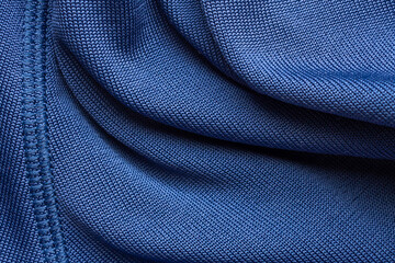 Blue sports clothing fabric football shirt jersey texture with stitches