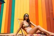 © thesweetsheep - Woman sunbathing on Summer beach (Ai generated)
