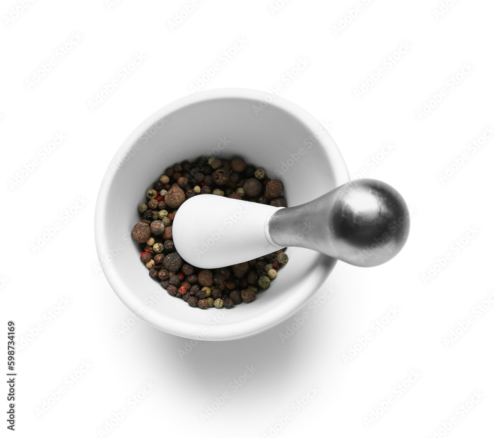 Mortar and pestle with peppercorns isolated on white background