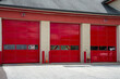 entrance gate to the fire station red automated garage sectional door