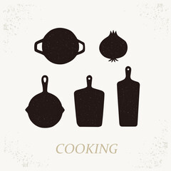 Black textured skillet and cutting board set, Modern vintage style kitchenware illustration.