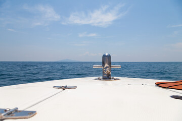 Wall Mural - View from the bow of the speedboat to the Andaman Sea with blue water and clear skies. Travel and holidays in Phuket.