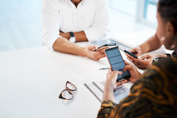 Poster - Success happens outside the comfort zone. an unrecognizable group of businesspeople sitting in the office together and texting on their cellphones.