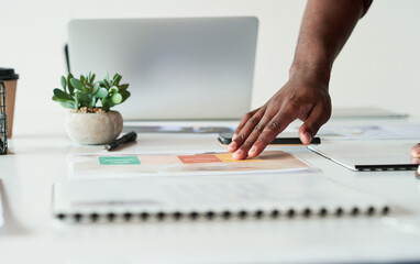 Poster - Its all apart of the plan. an unrecognizable businessman planning and going over paperwork in his office.