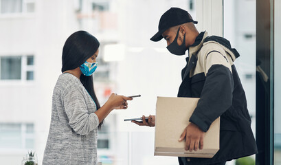 Sticker - It just makes smarter sense to pay the contactless way. a masked young man and woman using smartphones during a home delivery.