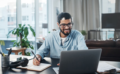 Poster - I actually prefer working from home. a young man using his laptop while working from home.