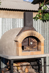 Aufkleber - Cooking real pizza in a brick oven. Wood and fire are burning in the stove.