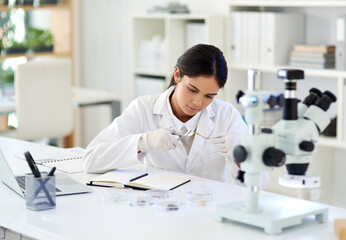 Aufkleber - Prepping the plant before testing. a young scientist working with plant samples in a lab.