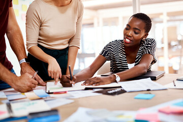 Aufkleber - Encouraging a non-traditional approach to problem-solving. a young businesswoman working with her colleagues in an office.