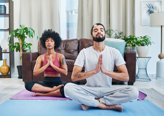 Poster - Yoga improved our health and our relationship. a young couple practising yoga in their living room.