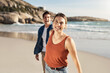 © Tinashe N/peopleimages.com - Living in the sunshine. a middle aged couple spending the day at the beach.