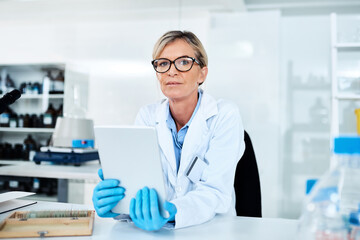 Poster - Capturing data with utmost ease. Portrait of a mature scientist using a digital tablet in a lab.