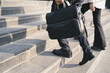© muse studio - Leather briefcase for business meetings People going to work.