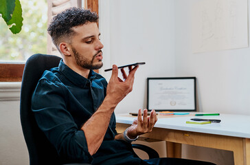 Poster - Im just calling with some feedback for you. a young businessman using a smartphone in a modern office.