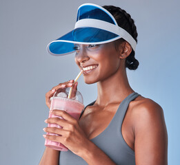 Sticker - Low in calories, high in taste. Studio shot of a fit young woman having a healthy drink against a grey background.