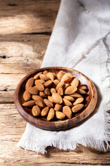 Wall Mural - pile of natural almonds (Prunus dulcis) close-up image