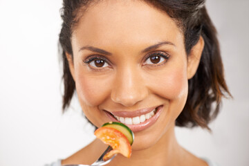 Poster - Just what I needed. Portrait of a young woman enjoying a salad.