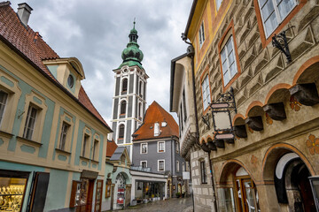 cesky krumlov street on latran, picturesque historical building and church.