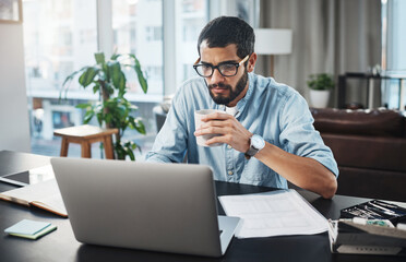 Poster - I work so much better without any office distractions. a young man using his laptop while working from home.