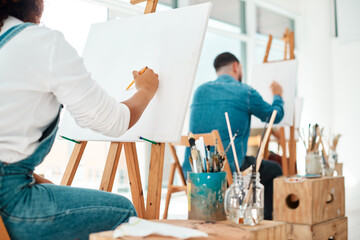 Aufkleber - The perfect space to get creative. two unrecognizable artists sitting and sketching on a canvas during a painting session in an art studio.