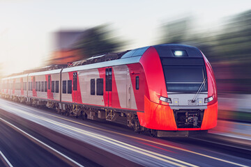 Wall Mural - Train moves fast at sunrise time.