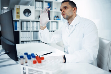 Aufkleber - It all begins in the blood. a young scientist conducting medical research on blood in a laboratory.