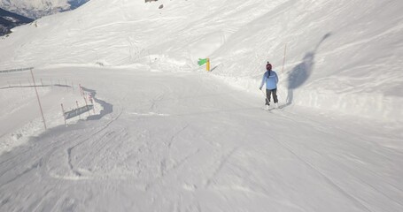 Wall Mural - Skiing in the Alps follow shot Generative AI