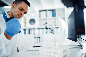Aufkleber - The clock is ticking to find a cure. a young scientist conducting medical research in a laboratory.