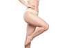 © Dimid - A slender swarthy woman in beige underwear on a white background. Healthy lifestyle, sport and diet.