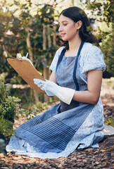 Poster - Growing in secret and in silence. a female florist completing stock take of her products.