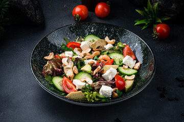 Poster - Green salad with Feta cheese, cucumbers, lettuce, cherry tomatoes, avocado, arugula and cashew nuts.