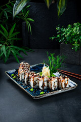 Poster - Japanese sushi roll set with eel, Philadelphia cheese, green peas, ginger and wasabi.