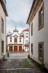 Wall Mural - Street view of the city of Mirandela in Portugal with the Misericórdia Church in the background.