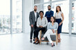 Great teams are filled with determined individuals. Portrait of a group of businesspeople posing together in an office.