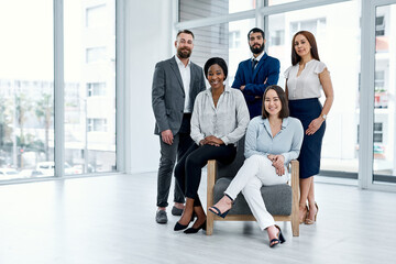 Sticker - Great teams are filled with determined individuals. Portrait of a group of businesspeople posing together in an office.